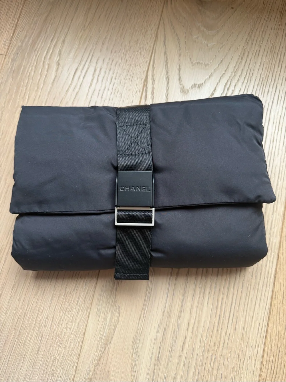 CHANEL Black Fold-Over Toiletry Pouch with Buckle Strap